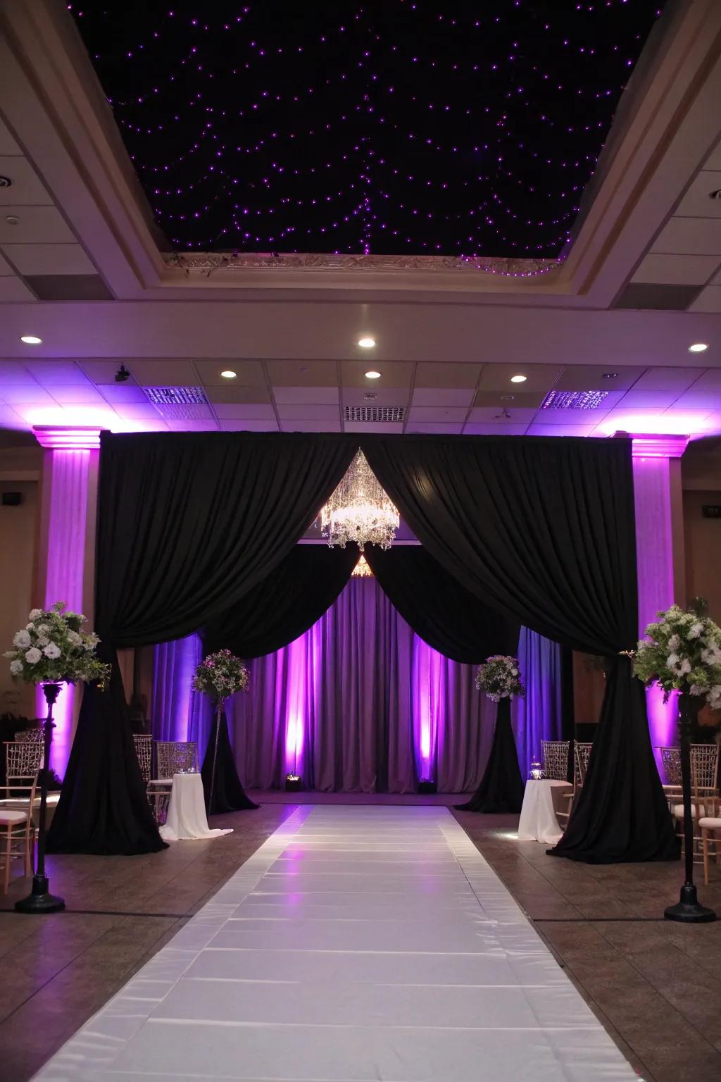 Impressive lighting featuring violet uplighting and dark fabric.