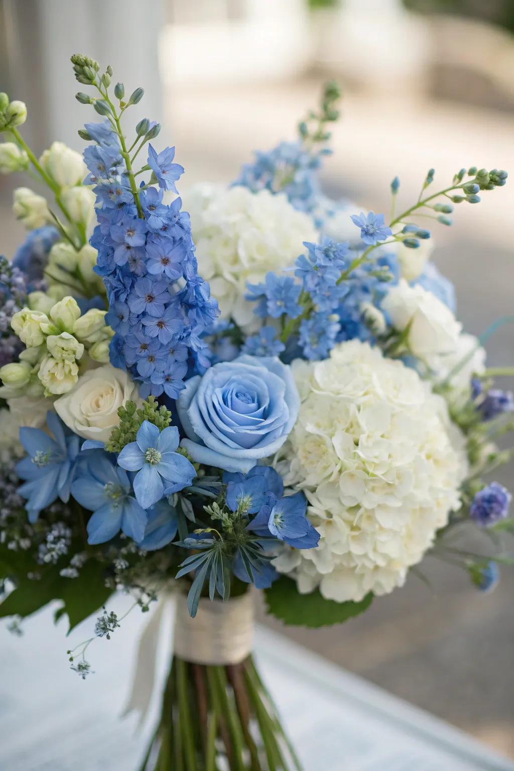 Gorgeous azure floral arrangements bring a natural element to the celebration.