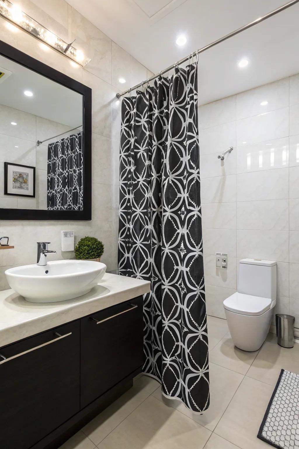 A striking black and white shower curtain enhances this modern bathroom.