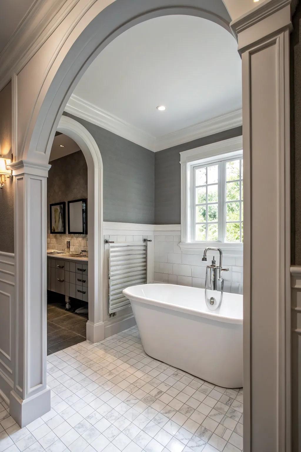 Grey walls with white features create a classic and balanced bathroom design.