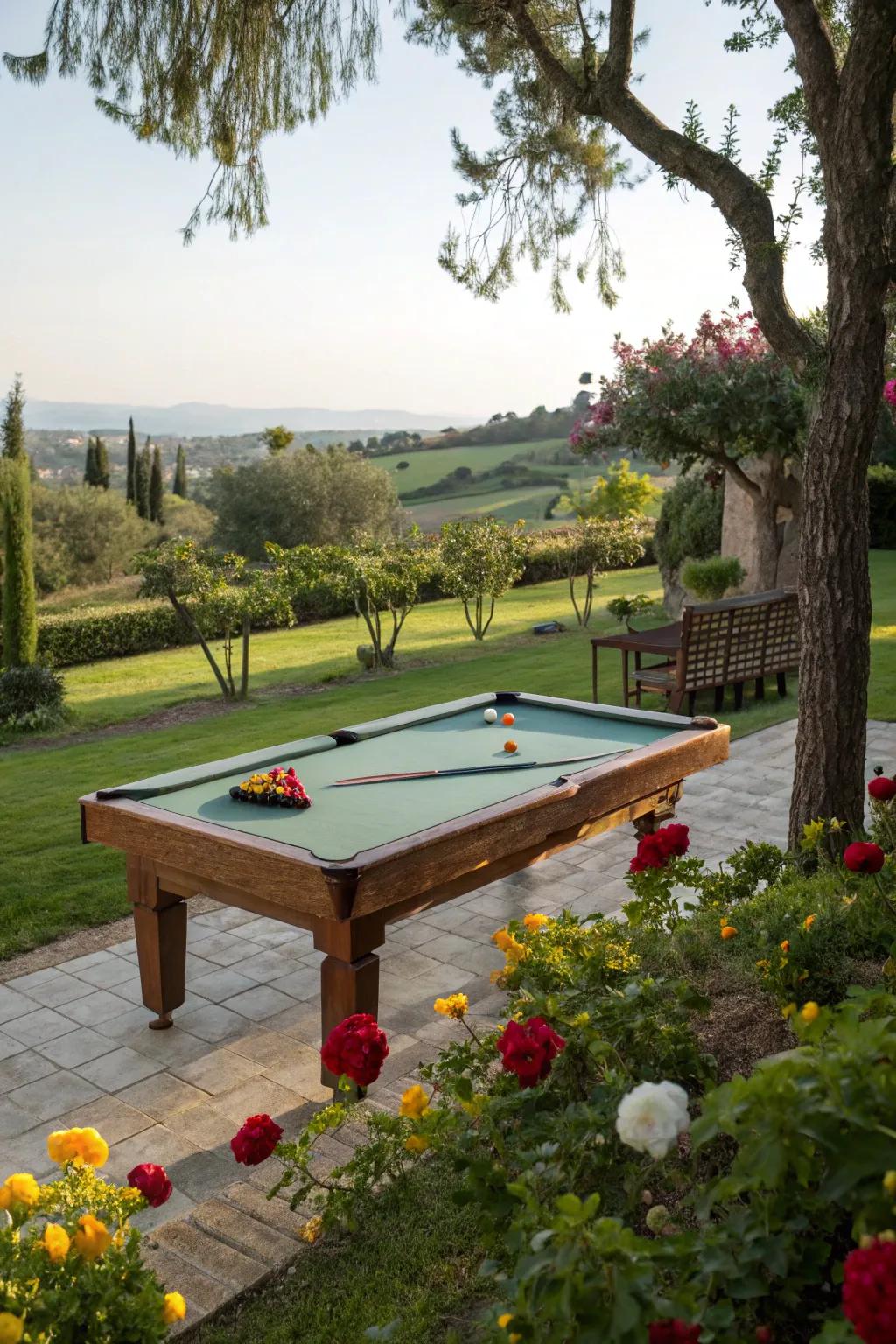 A pool table with beautiful views of a lush garden.