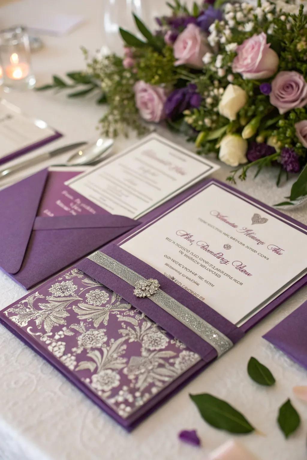 Violet and silver cards set the stage for an elegant wedding.