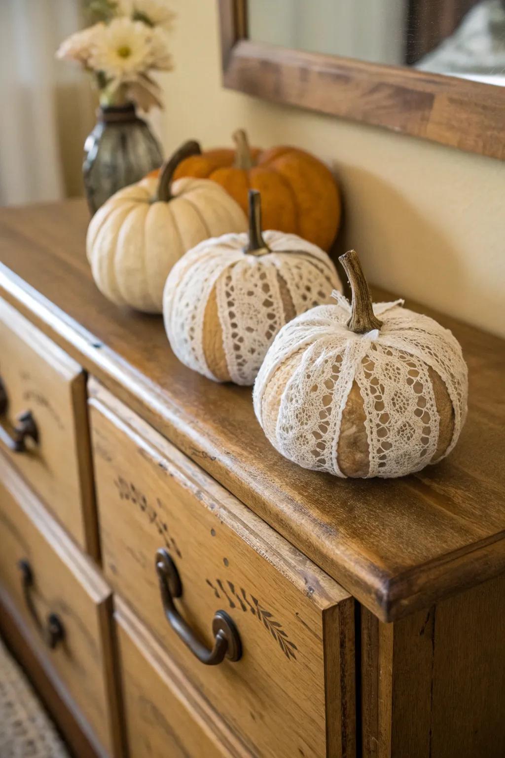 Pumpkins wrapped in lace exudes classic charm and elegance.