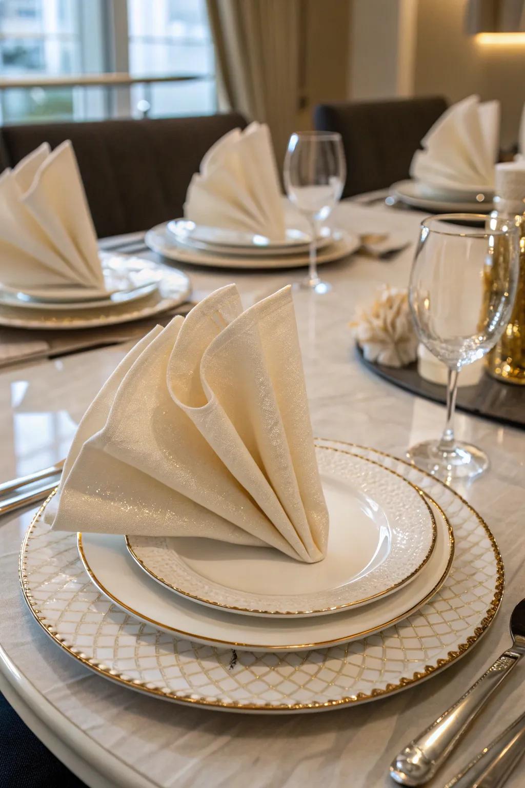 Elegant napkin folds providing a sophisticated touch.