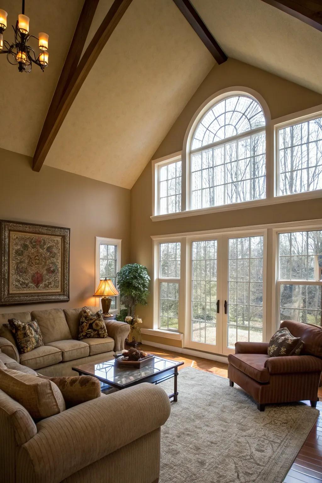 A family room showcasing a vaulted ceiling, highlighted by expansive windows accentuating the feature wall