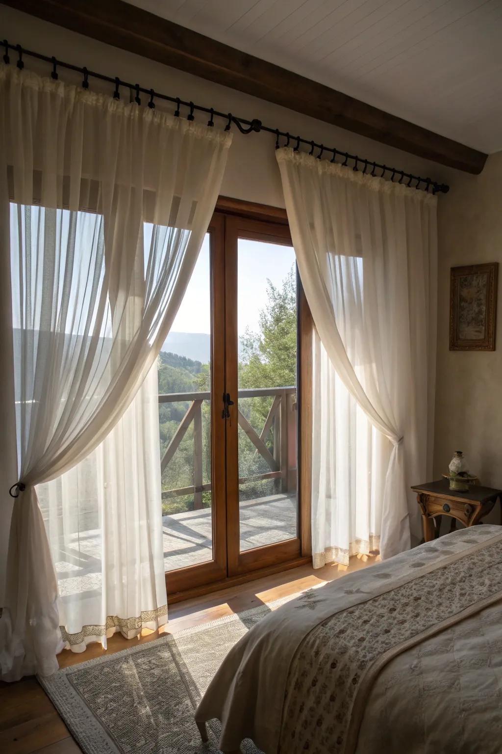 Layered draperies and light filtering panels compose a soft and welcoming ambiance.