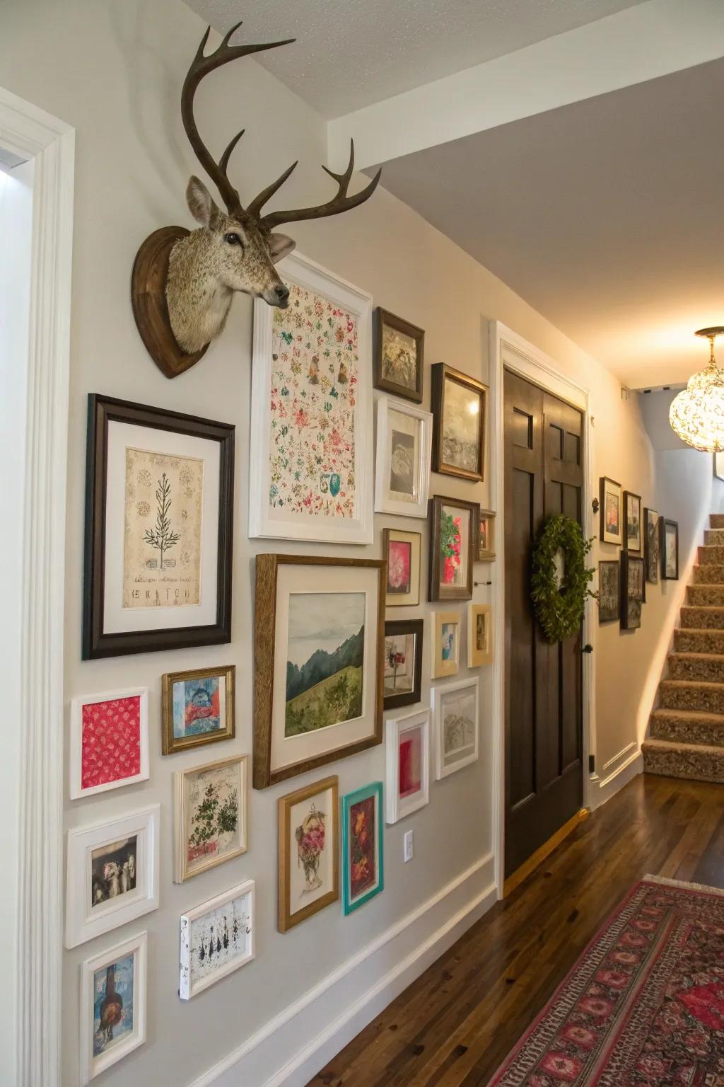 An eclectic gallery wall highlights a deer skull mount beautifully.