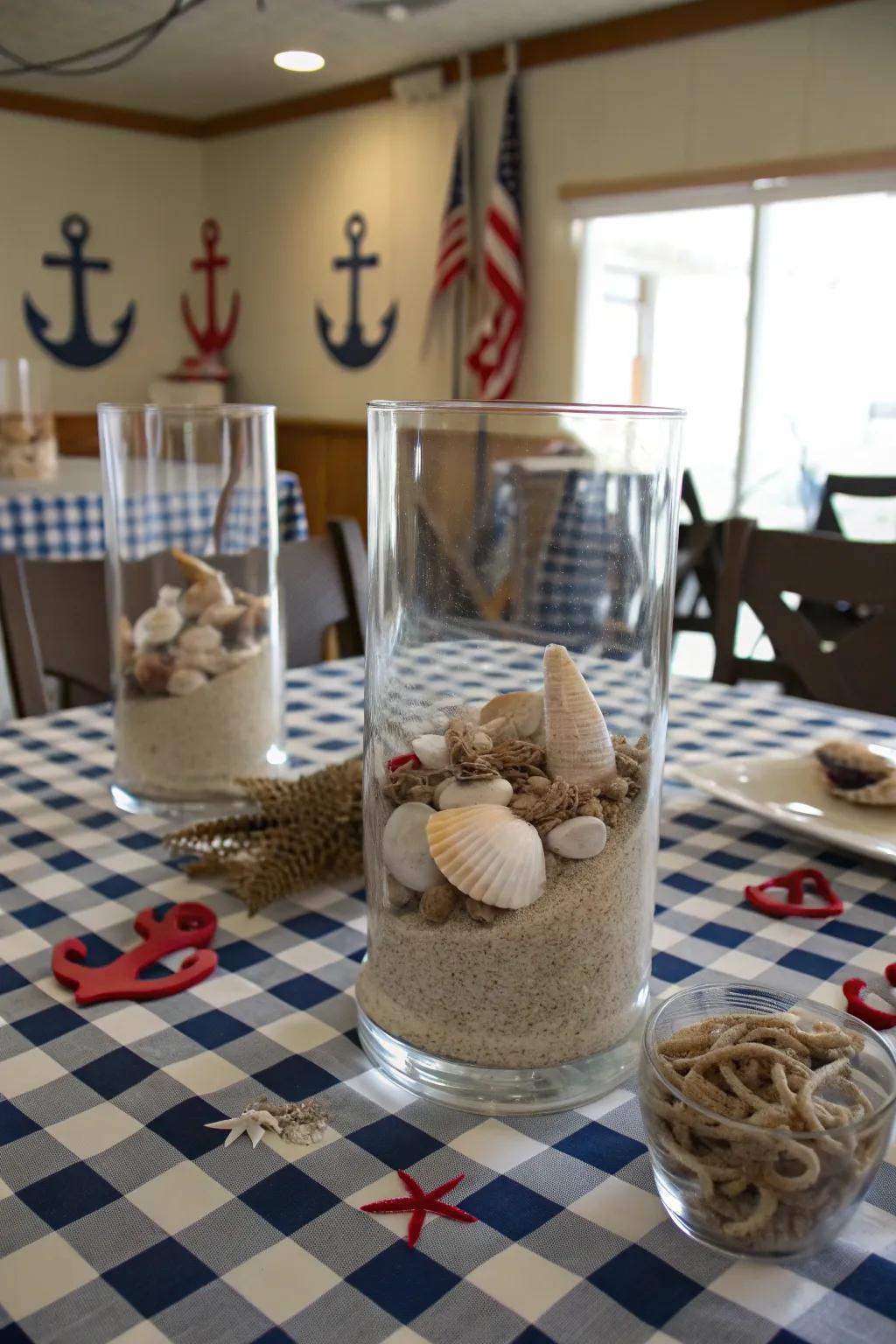 Sand and seashells in hurricane vases for a beach-inspired centerpiece.
