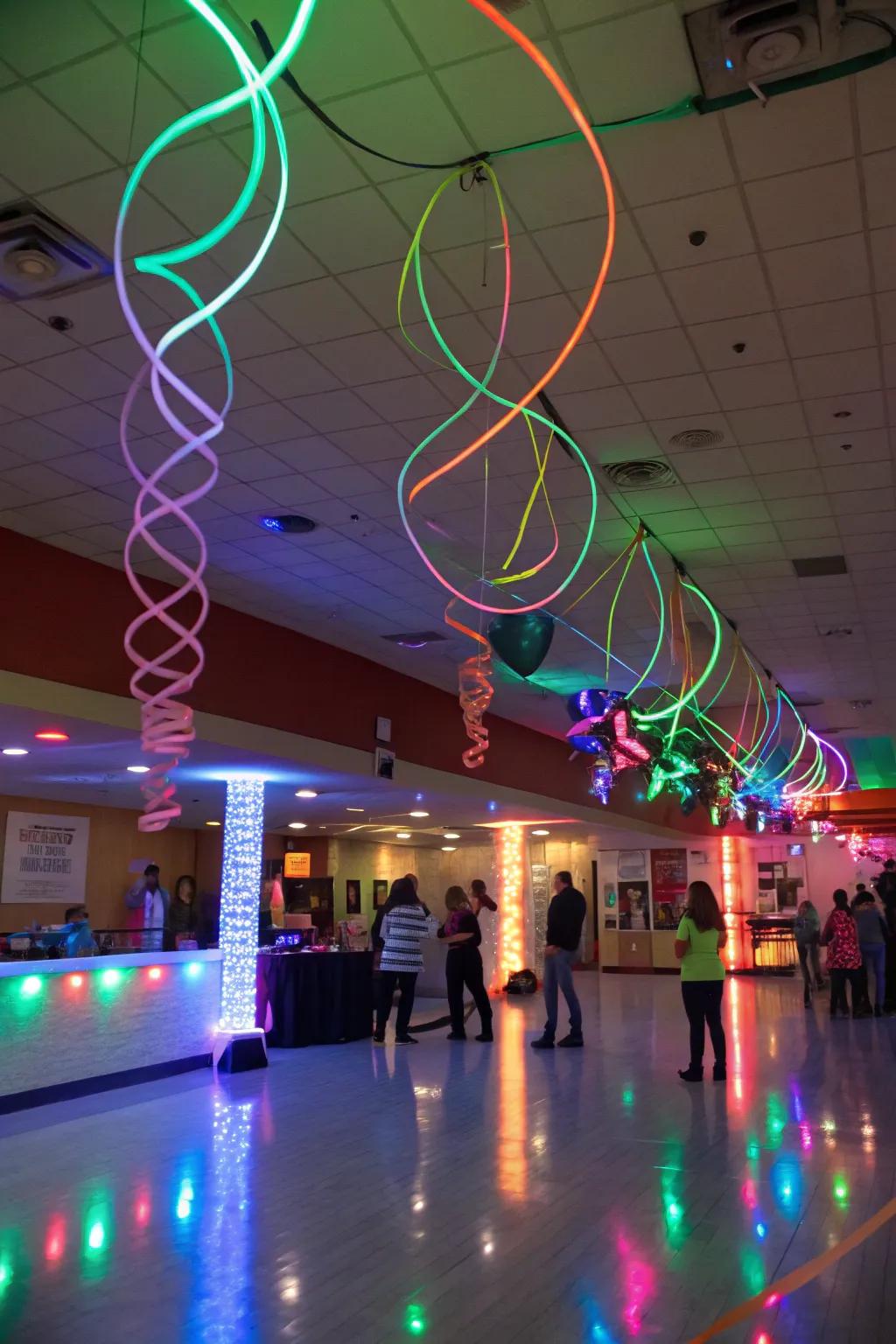 Hanging neon streamers and strings creating a dynamic atmosphere in a glowing celebration room.