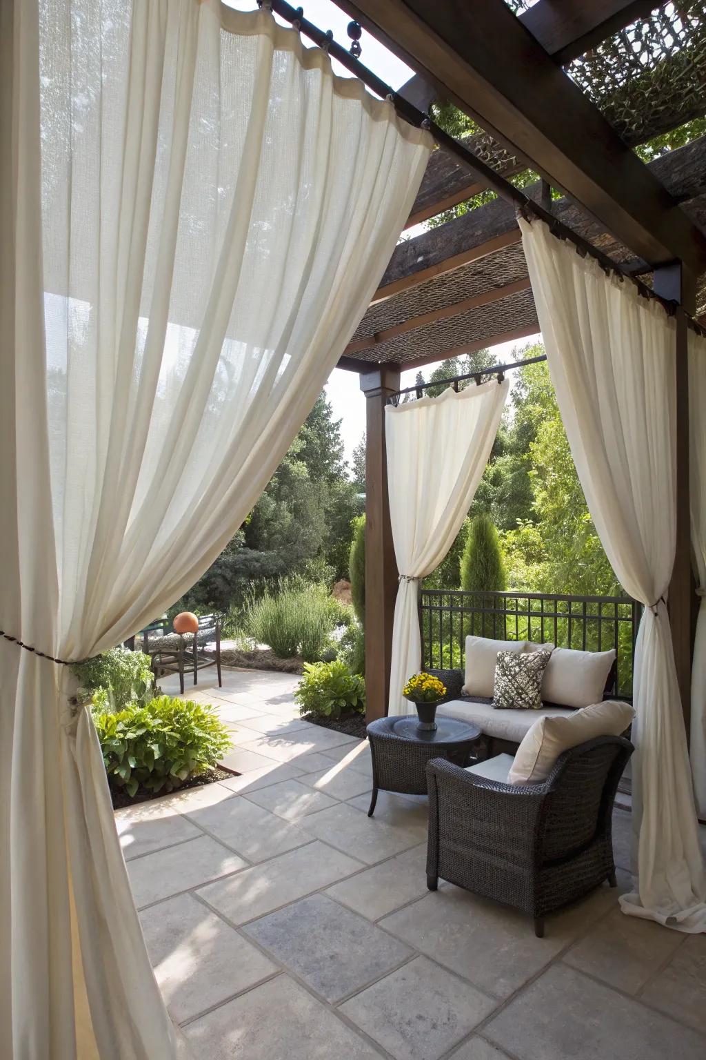 Outdoor curtains provide adaptable shade and a breezy feel.