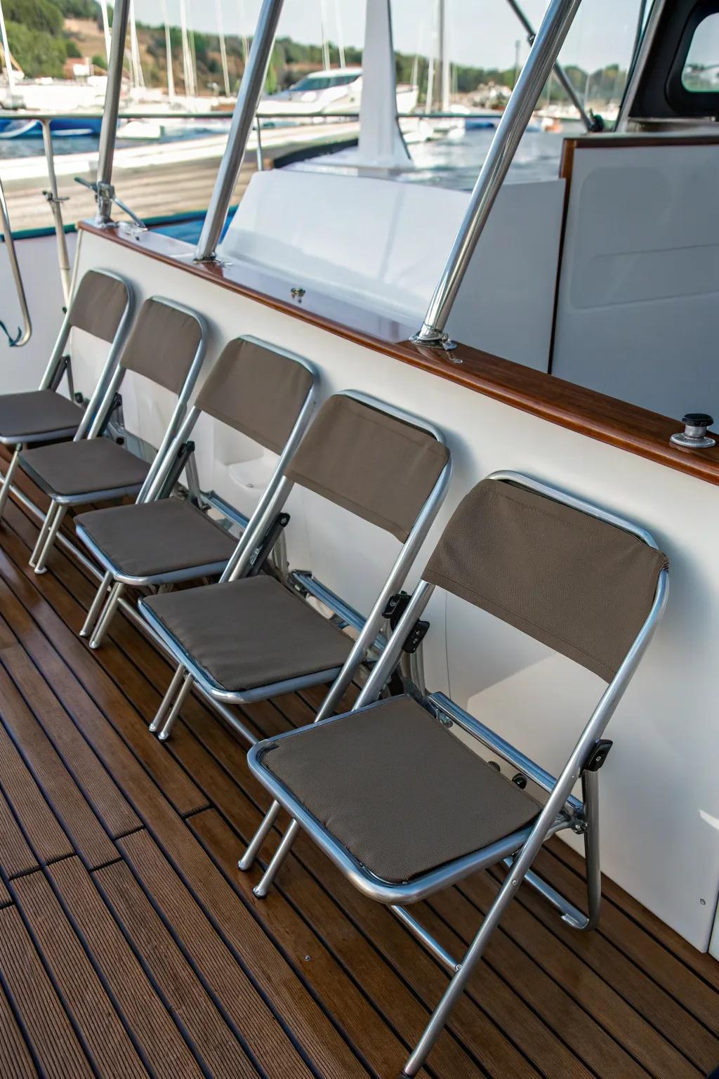Compact folding chairs inside a boat's interior.