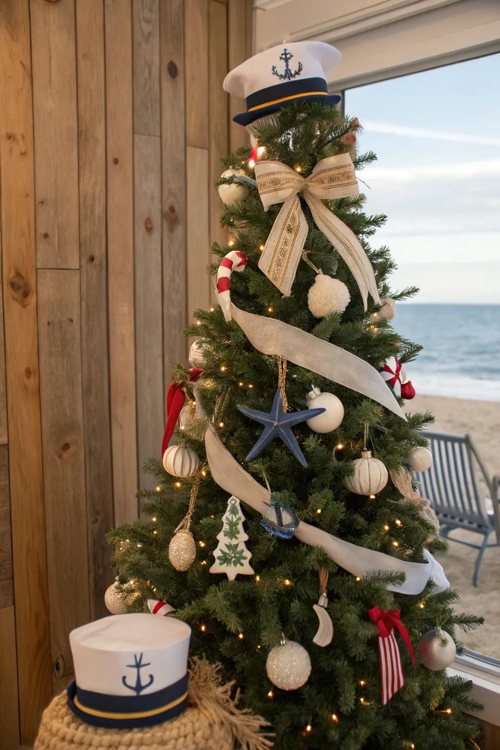 A Christmas tree with a nautical theme, presenting ribbons and ornaments suggestive of the sea.