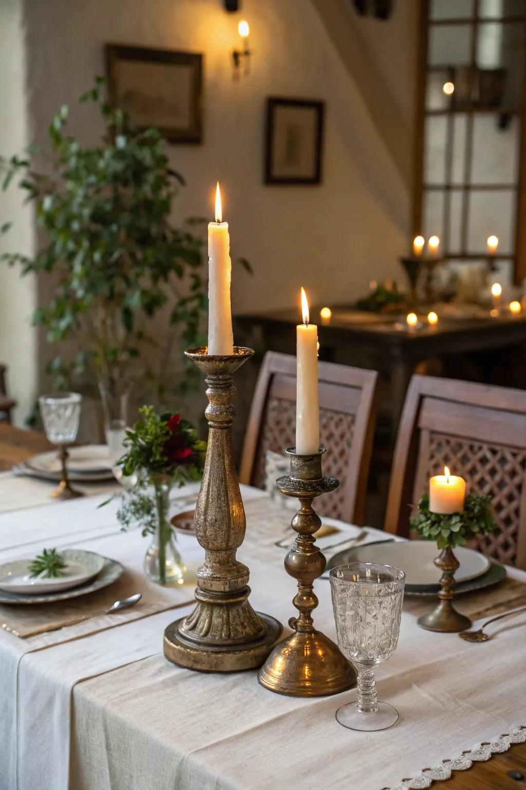 Wax lights in vintage holders produce a cozy and welcoming atmosphere.