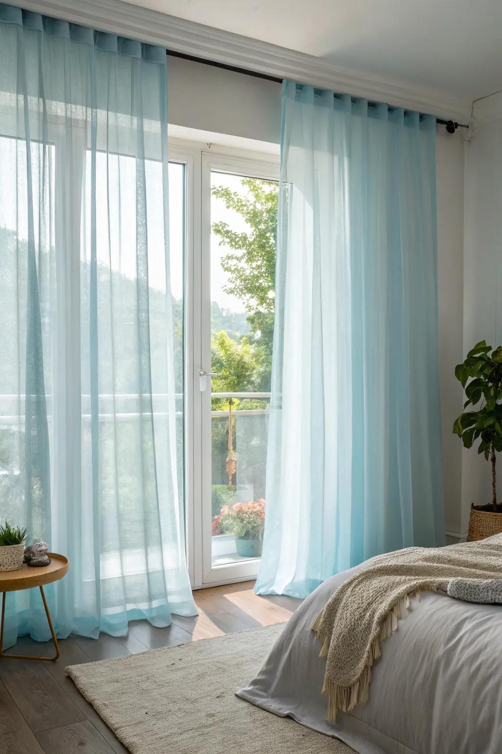 Light blue curtains make the room brighter and more airy.