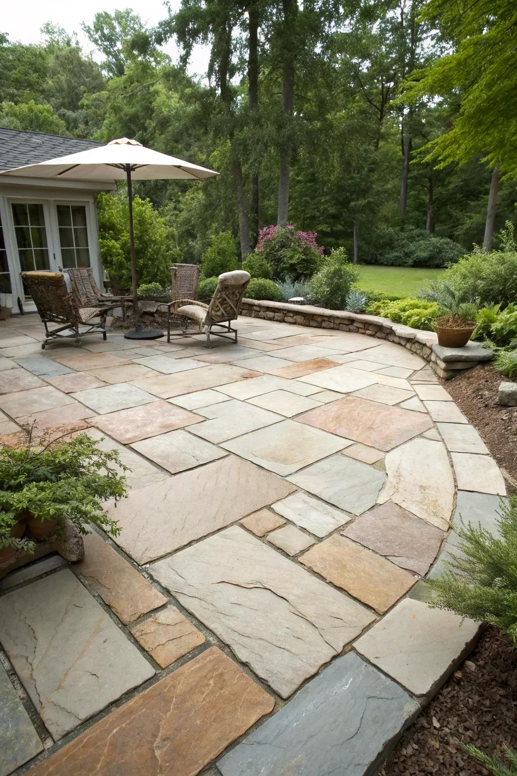 A paver patio featuring natural stone pavers, providing a timeless and stylish appearance.