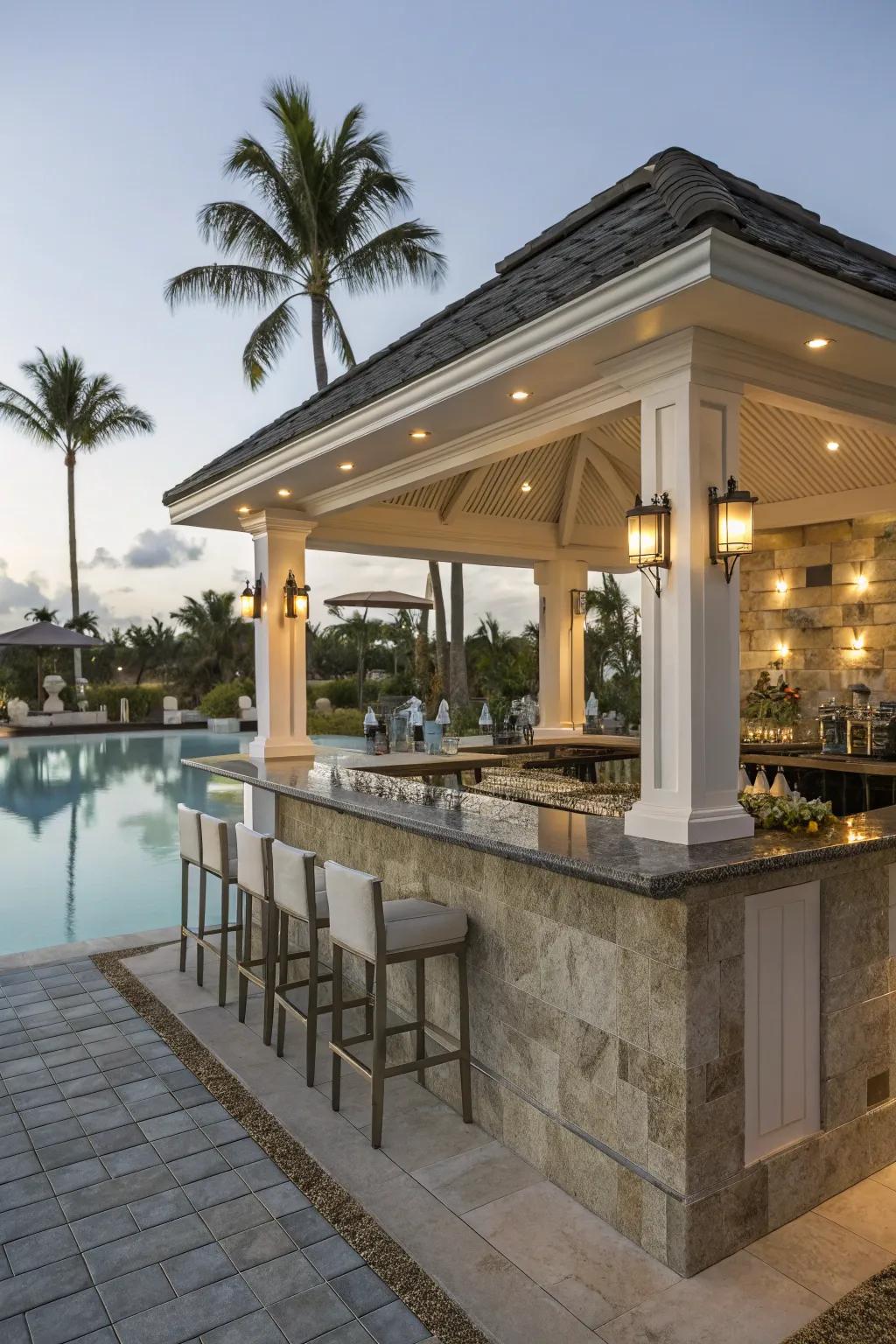 A bar pavilion with counter seating is the ideal spot for poolside drinks and socializing.