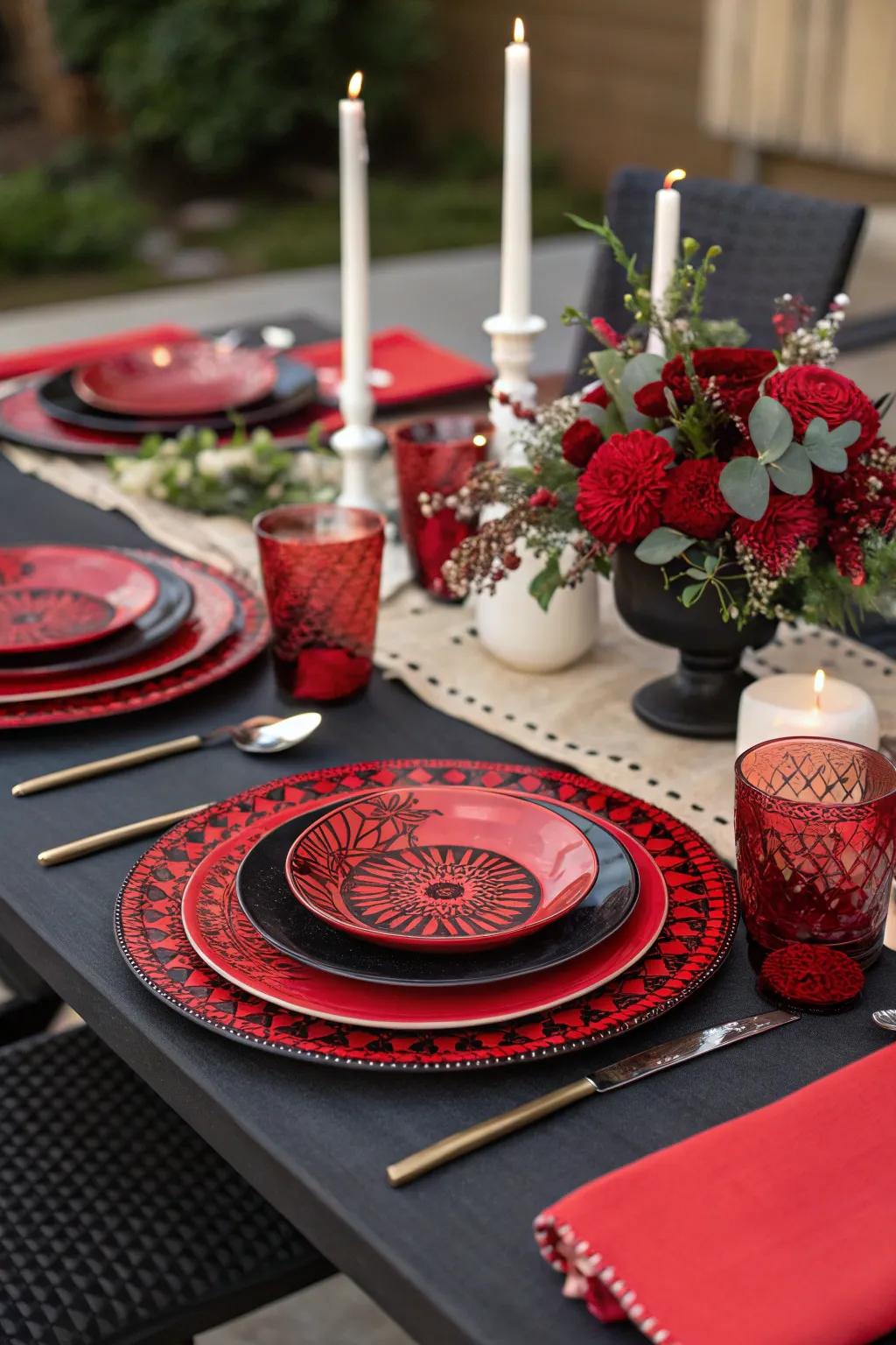 Scarlet and obsidian themed tableware ideally complementing the centerpiece.