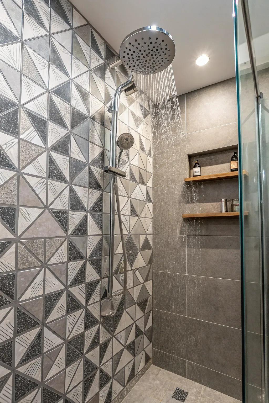 Geometric grey tiles compose a modern shower design.