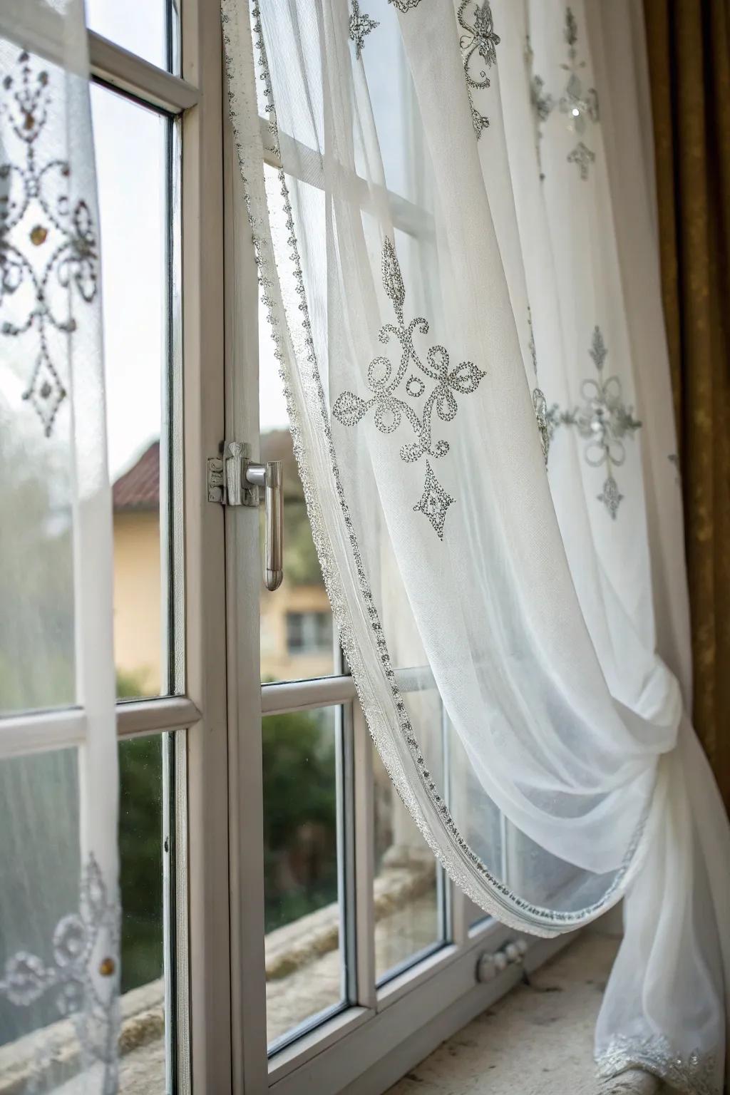 Fill your space with light using sheer white drapes and touches of silver.