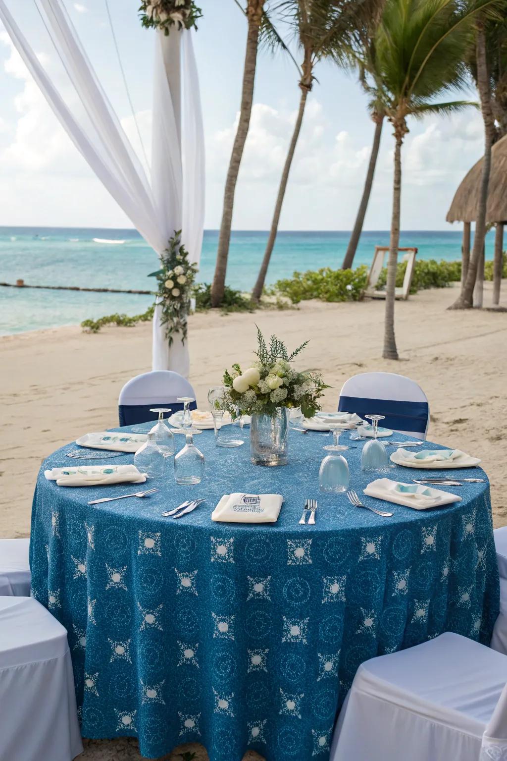 Nautical-themed table covering for a serene seaside wedding.