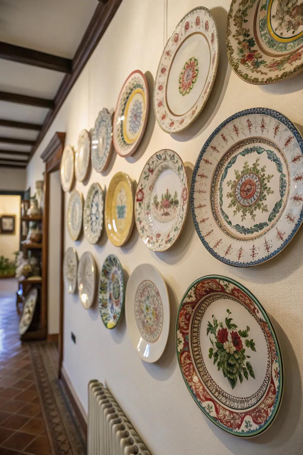 An eclectic collection of antiquated plates creates a charming wall display.