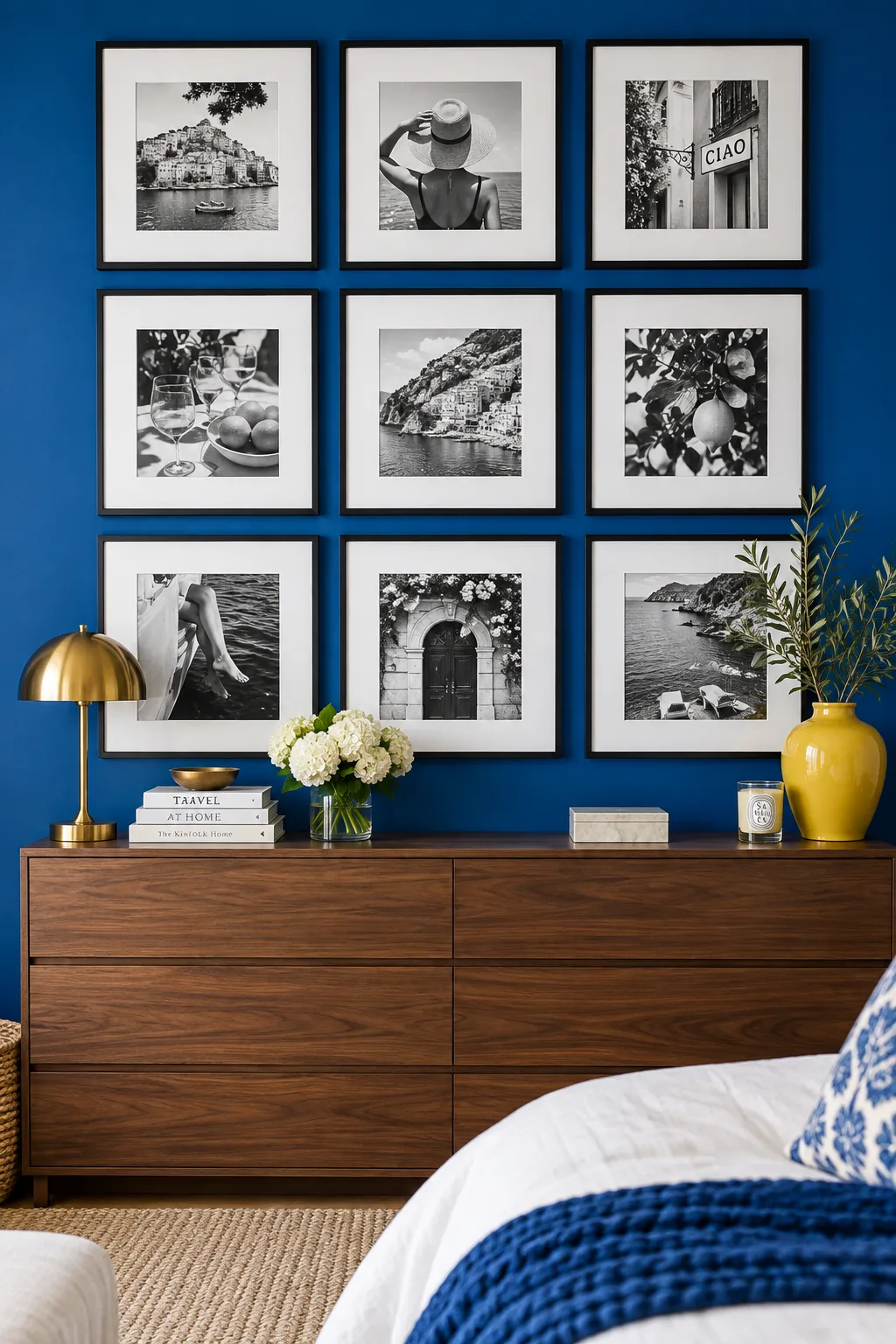 Nine square black-and-white photos arranged in a grid above a dresser