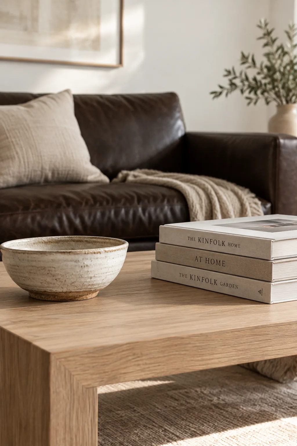 Minimalist living room featuring a dark brown couch