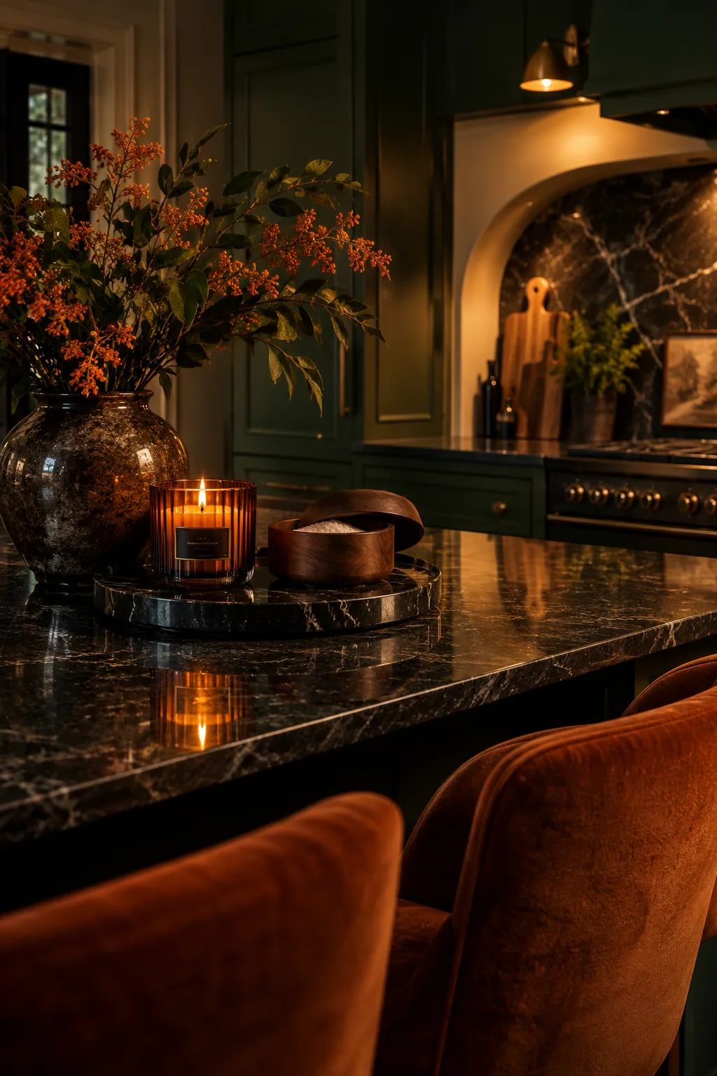 Black marble tray holding an amber glass candle and a dark walnut salt cellar