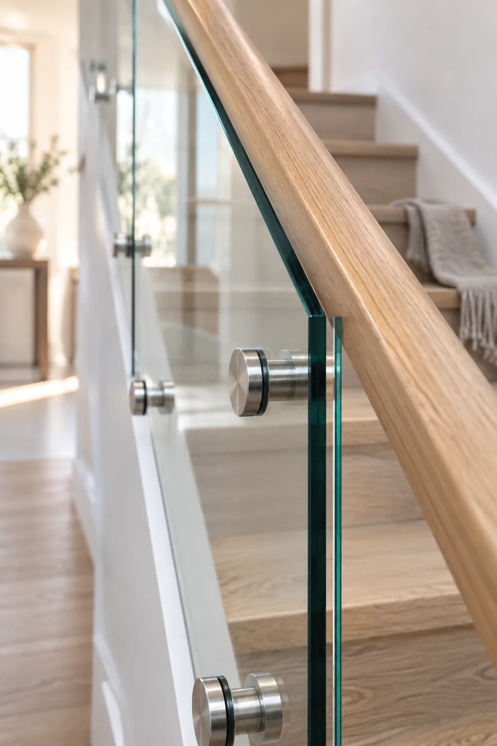 Minimalist staircase with clear glass panel railings