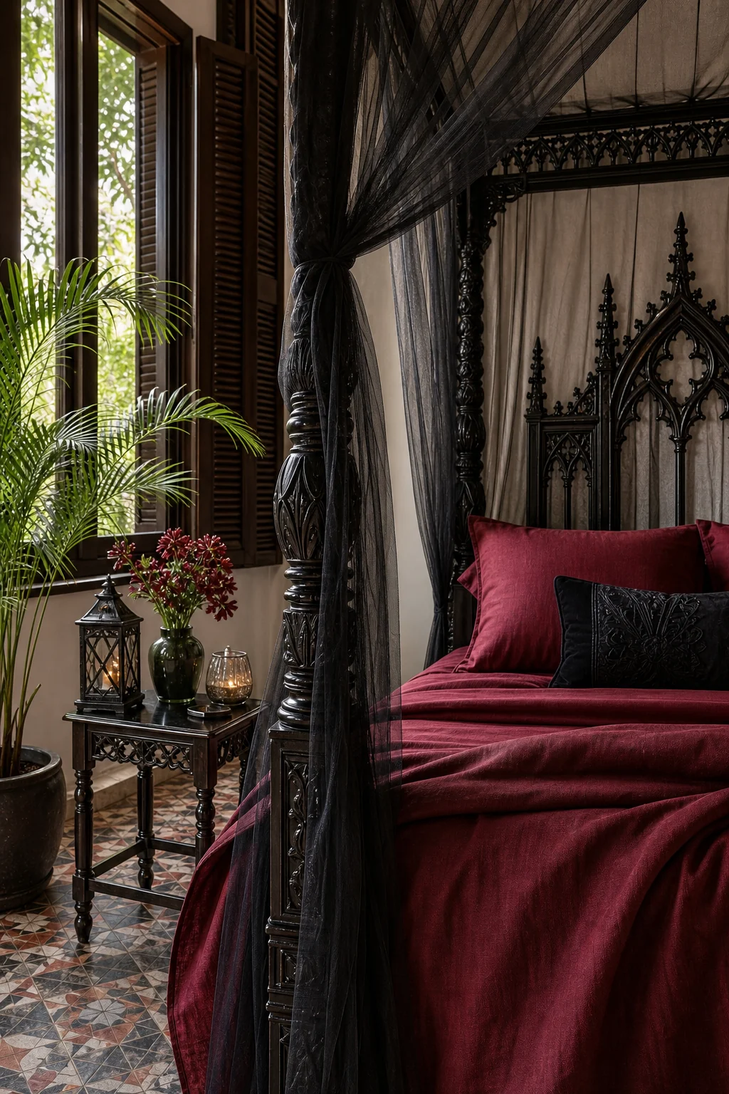 Macro detail of dark crimson linens and sheer charcoal netting against a teak headboard