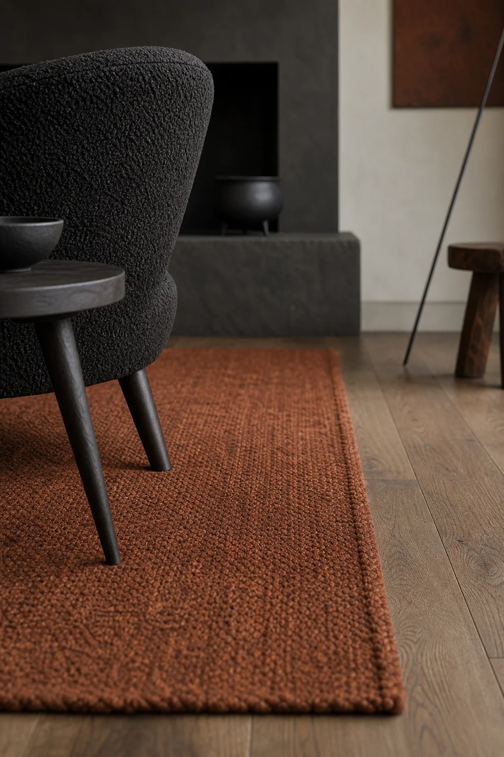 Warming the floor with ember tones in the finished living room